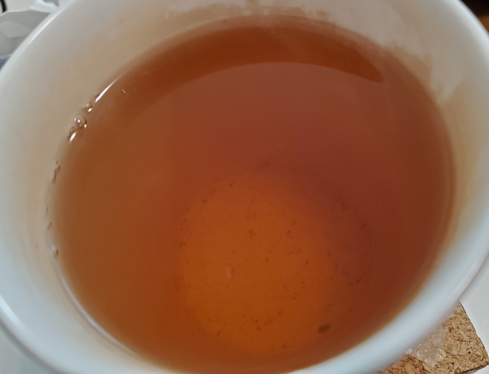 Golden red puerh sheng tea