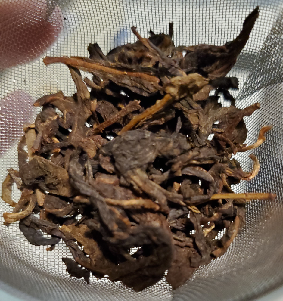 Loose puerh sheng tea leaves